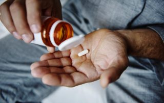 man struggles with prescription drug addiction