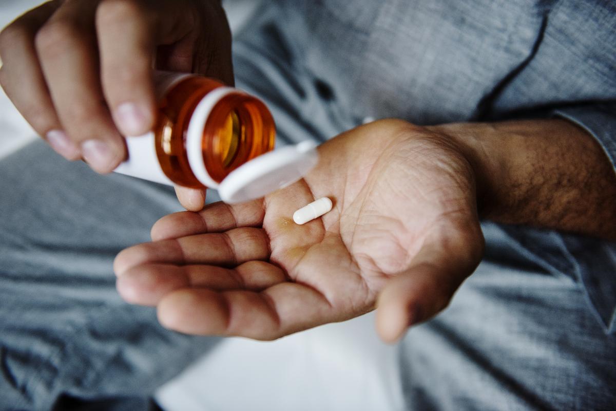 man struggles with prescription drug addiction