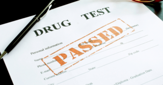 Drug test form with the word "PASSED" stamped in large red letters.